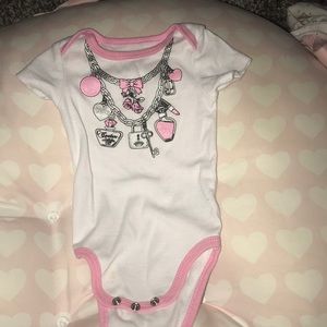 Juicy Couture onesie.